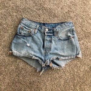 Levi’s distressed light blue denim shorts